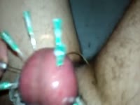 Man injecting pins all over his dick